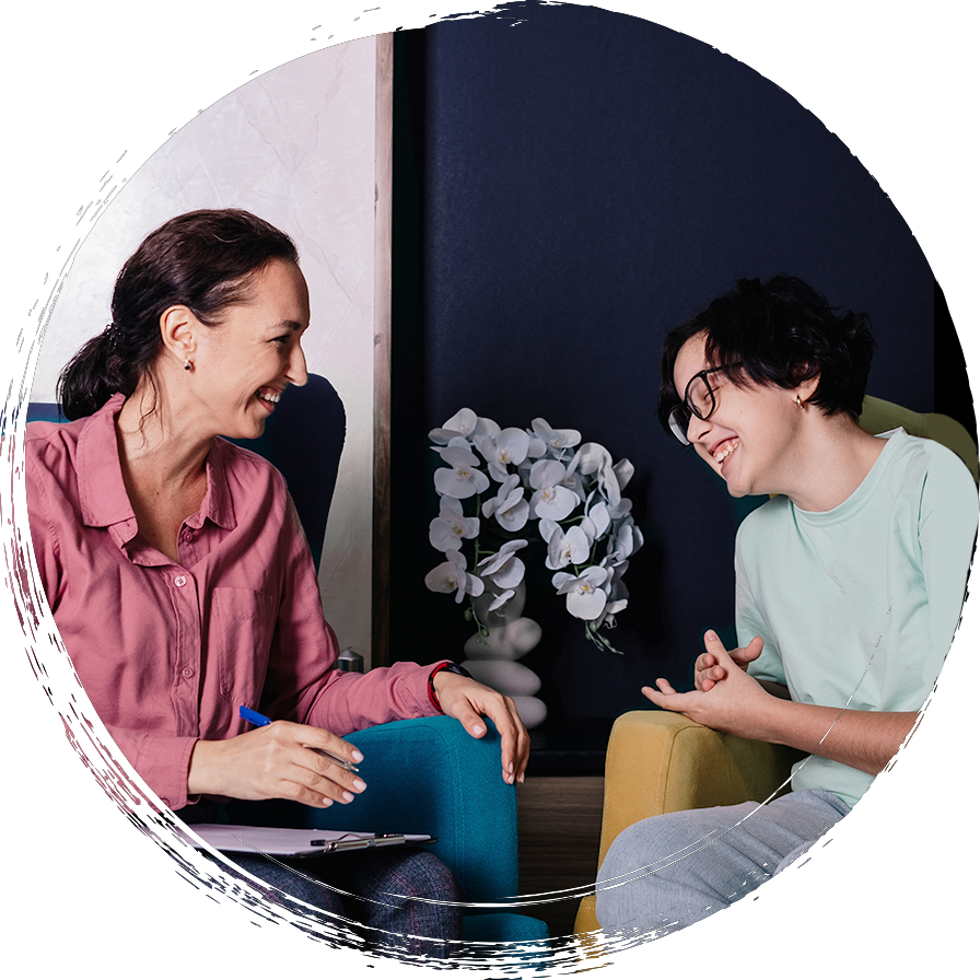 woman and young teen during a counseling session